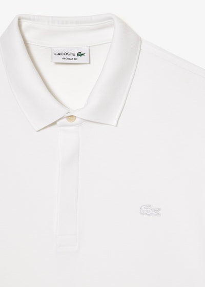 Polo Paris manches longues Lacoste blanc